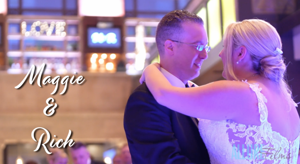 Maggie and Rich hold each other during their first dance.